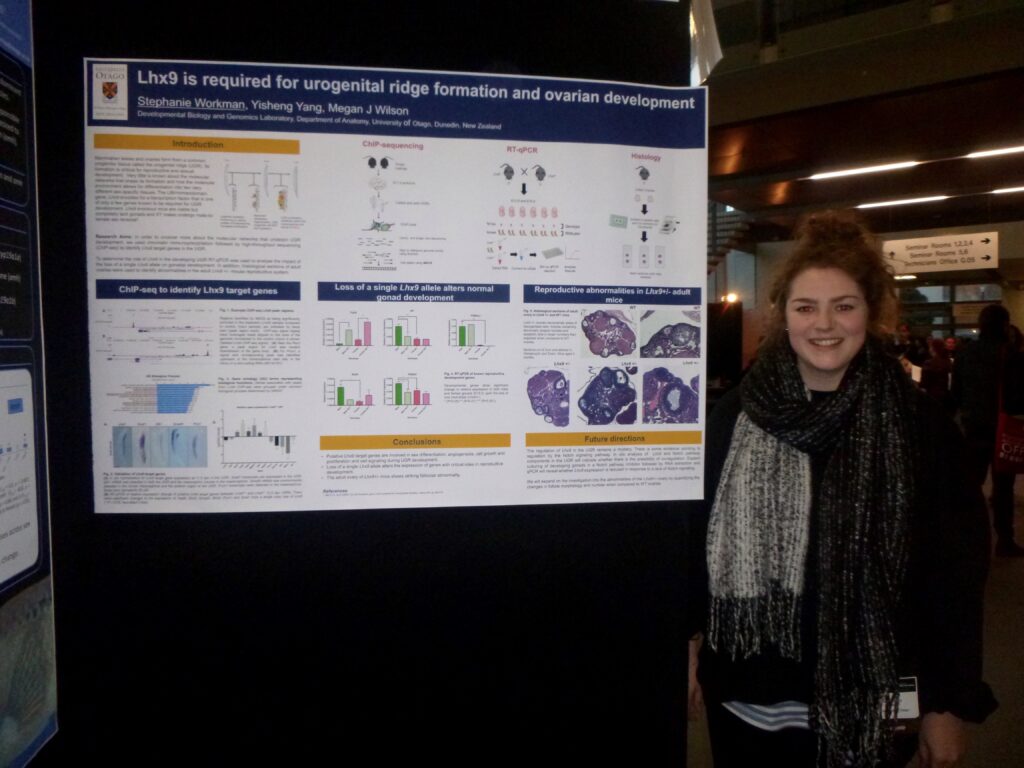 Photo of Stephanie Workman standing infront of her research poster